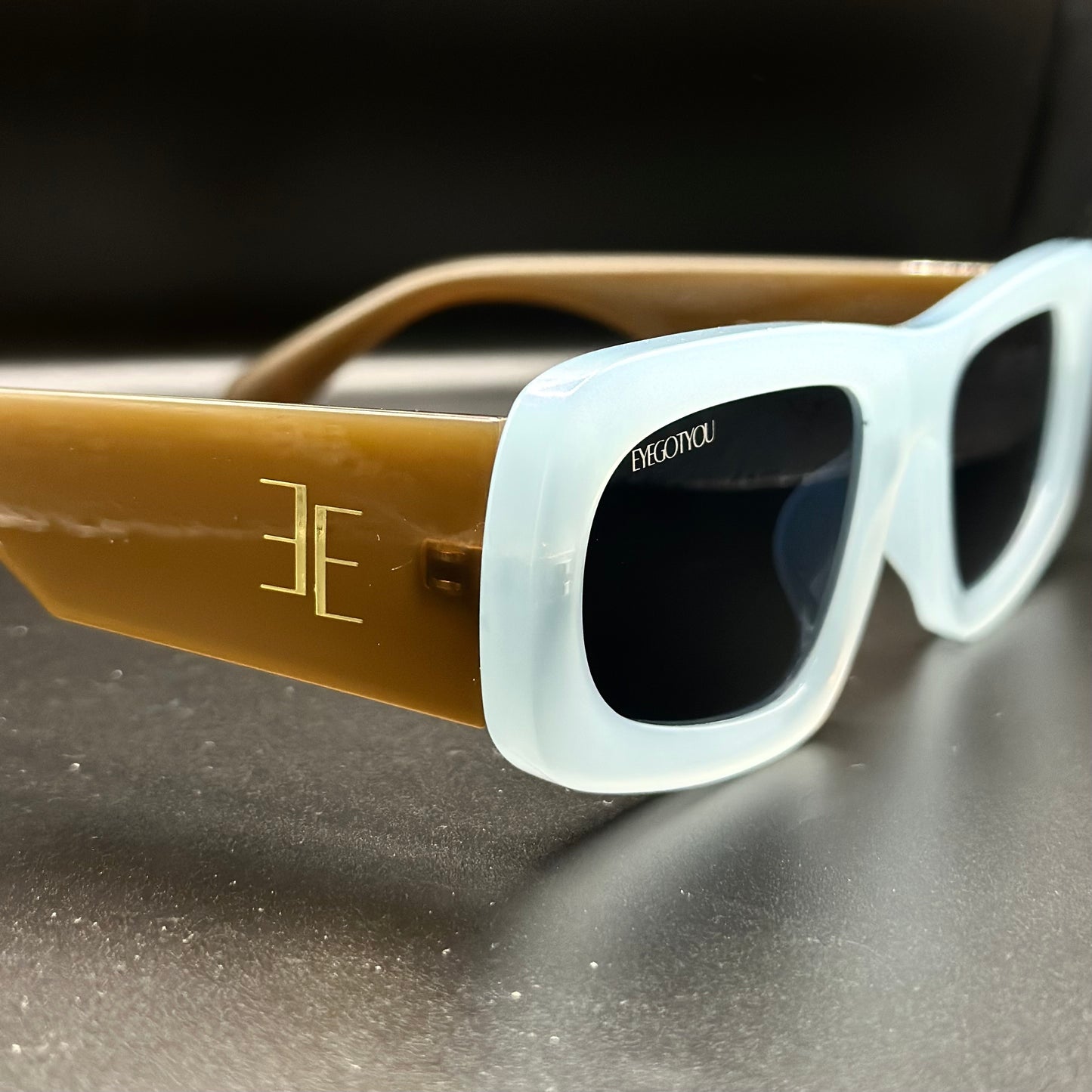 atlas. (baby blue w/ brown temple)