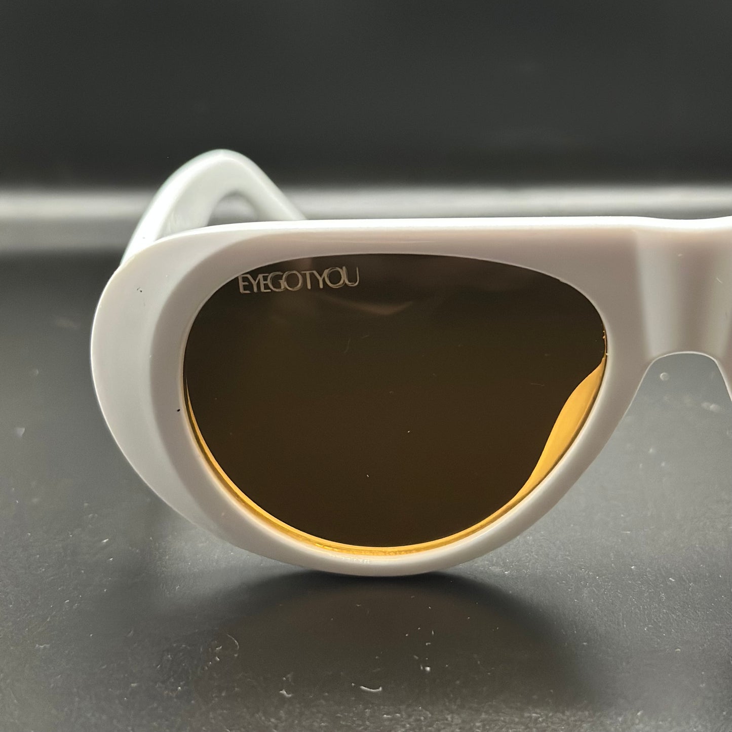 jet. (white w/ brown lens)