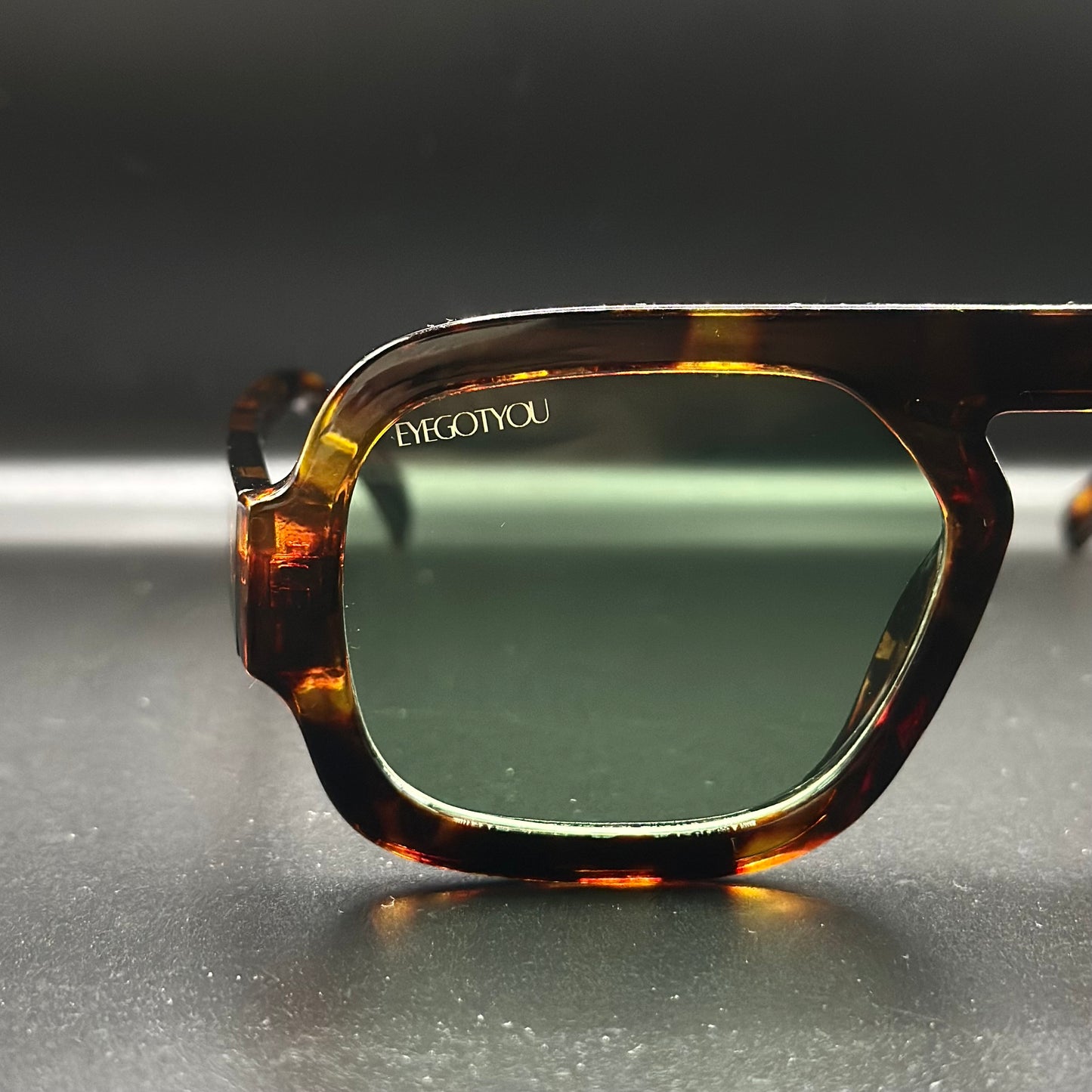 metro. (tortoise shell w/ green lens)